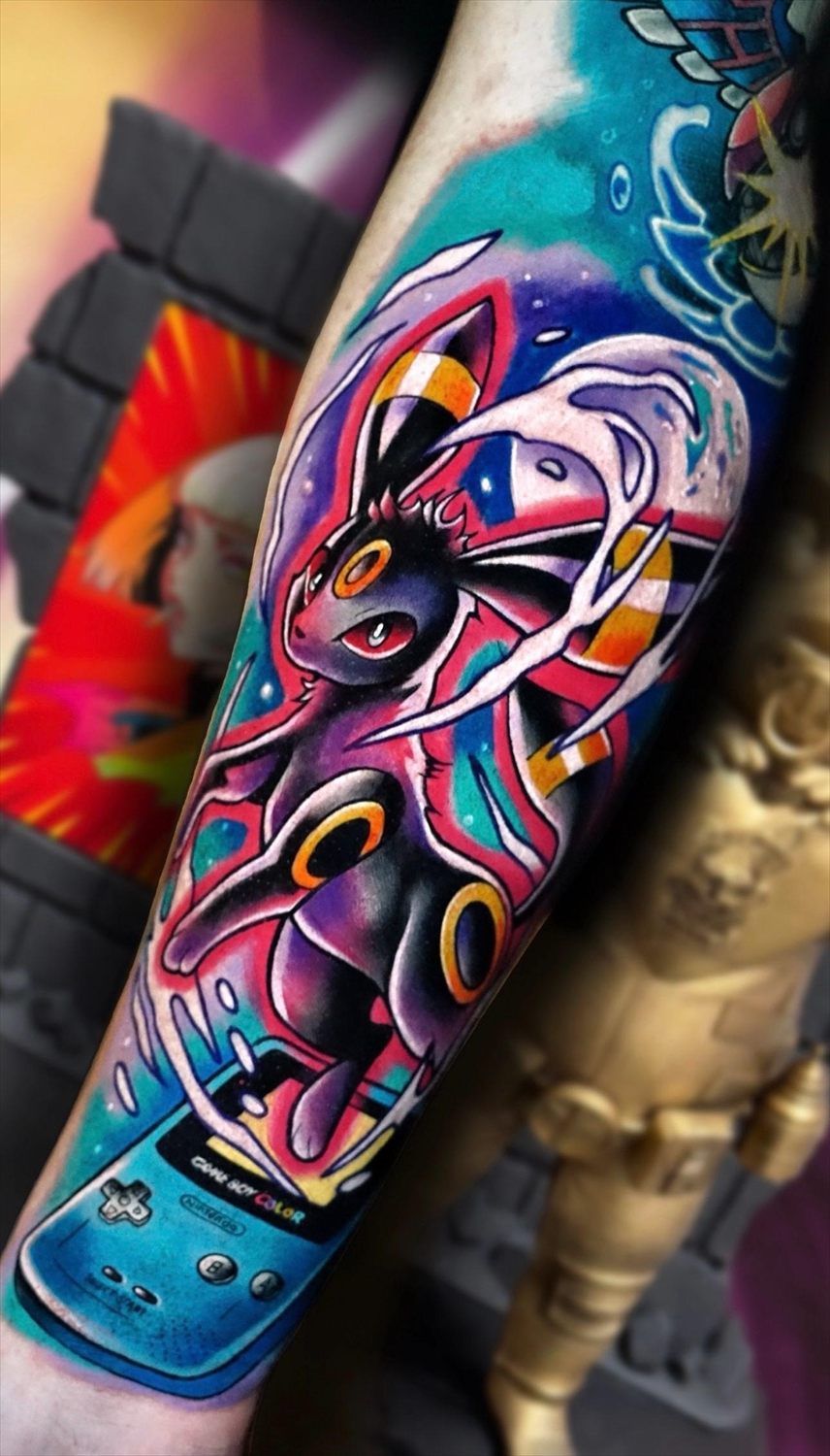 Tatuaje anime en color por Adrián en Twin Bros Tattoo